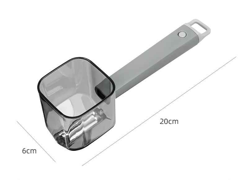 Petra store Stainless Steel Single Head Peeler with gray handle and measuring cup attachment