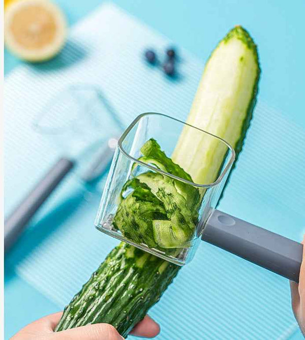 Stainless Steel Single Head Peeler peeling cucumber with ergonomic handle from Petra store