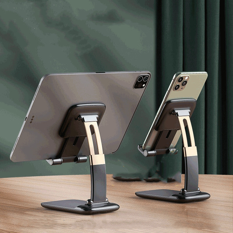 Petra store portable phone stand for desk holding a tablet and smartphone on wooden surface