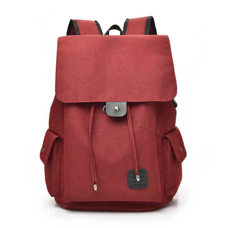 Red travel backpack for teenage girls from Petra store with front flap and side pockets