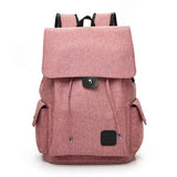 Pink travel backpack for teenage girls with flap cover and side pockets from Petra store