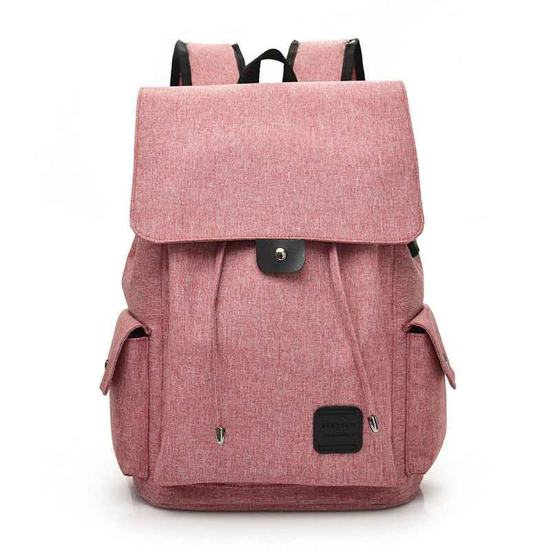 Pink travel backpack for teenage girls with flap cover and side pockets from Petra store