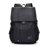 Black travel backpack for teenage girls with flap closure and side pockets by Petra store