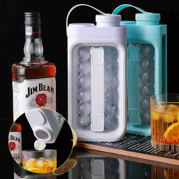 Petra store portable ice ball maker kettle in white and teal with whiskey glass and Jim Beam bottle