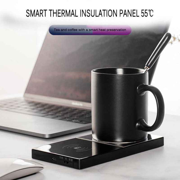Petra store USB mug warmer with phone charging black mug on sleek warming pad beside laptop for desk use