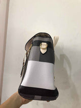Petra store striped black gray white crossbody stylish bag for women side view with gold hardware