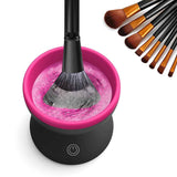 Petra store Makeup Brush Cleaning Machine with black and pink design cleaning a makeup brush with foam and set of brushes
