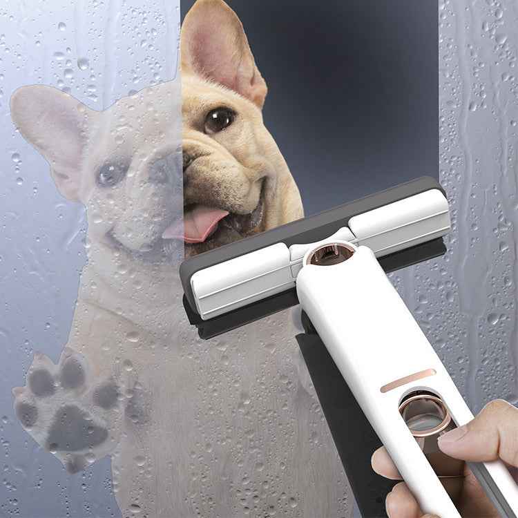 Petra store mini cleaning mop wiping water from glass with dog visible behind the wet surface