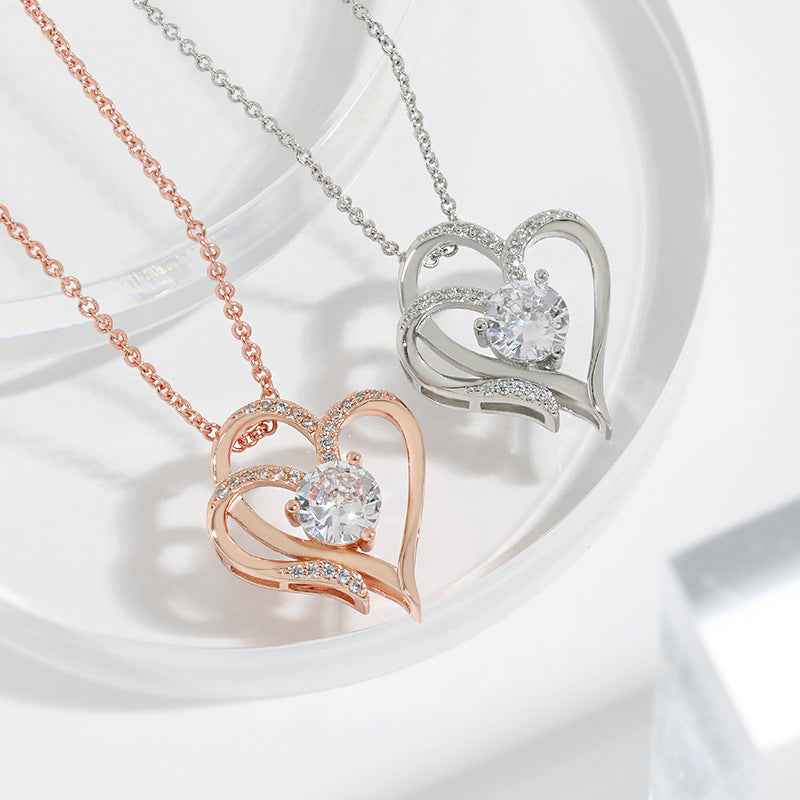 Zircon Double Love Necklace in rose gold and silver with heart-shaped design and sparkling stones
