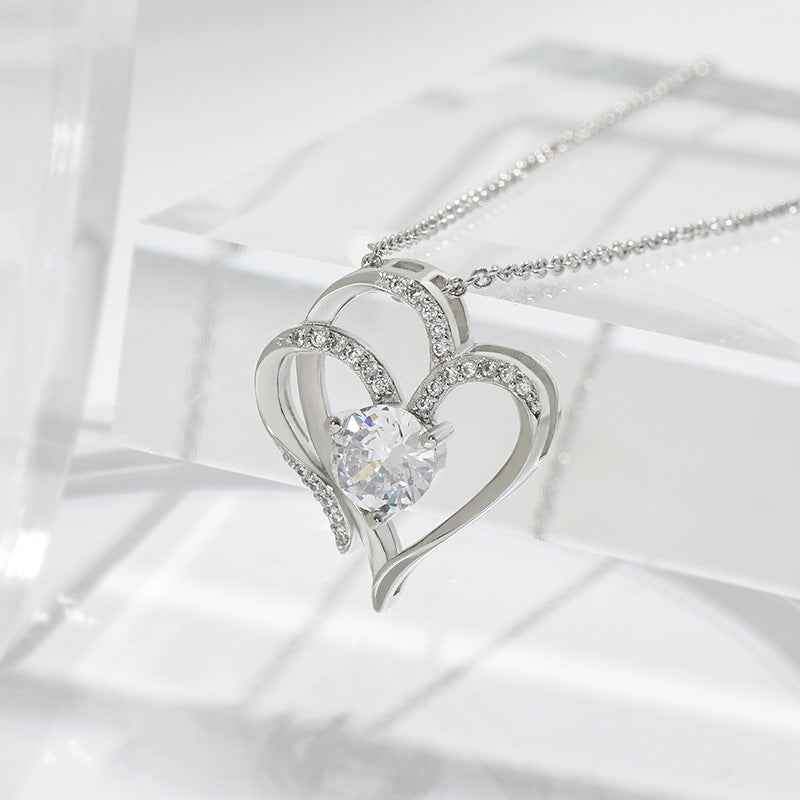 Petra store Zircon Double Love Necklace with heart-shaped design and sparkling stones on silver chain