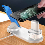 Petra store wireless charger for smartphones with multiple device charging dock on wooden table