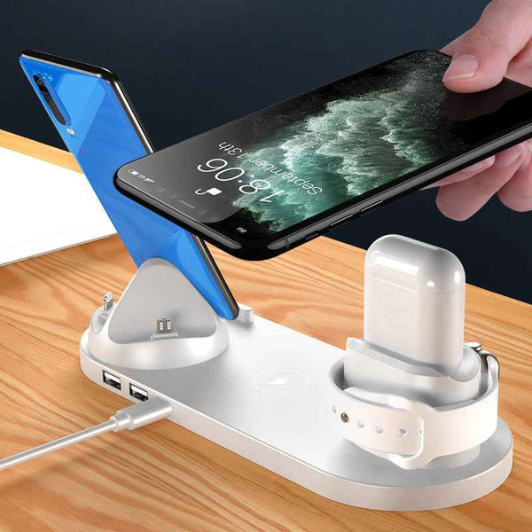 Petra store wireless charger for smartphones with multiple device charging dock on wooden table