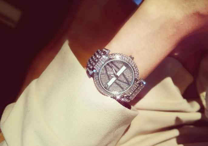 Petra store women's quartz watch with silver glitter dial and diamond-studded metal strap