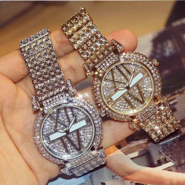 Petra store women's quartz watch with sparkling crystal-studded bands and glittery dials in silver and gold tones